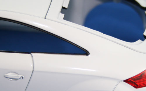 Paint finish from the factory is sturdy with acceptable coverage. The window trim has already been mask sprayed at the factory. Note the nice snug fit of the tail light lens.