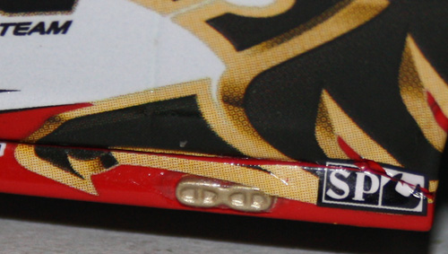 The lion and the gold trim (eg, around the edge of the TOLL signage) is a composite of coloured dots. Exhaust outlet is nothing fancy and body colour shows through the torn decal between the main body and side skirt.