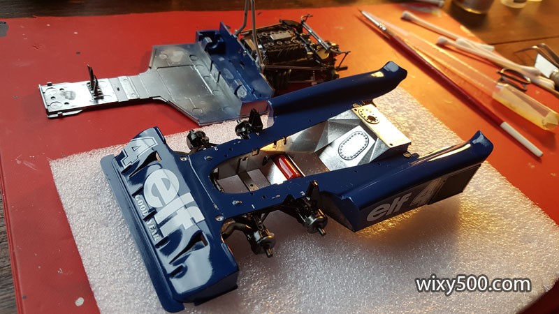 The two main parts of Tamiya's 1:20 Tyrrell chassis, ready to come together. The adhesive residue came off ok during polishing. Unfortunately, the final finish is not as good as how the rear wing main element came up. If I'd polished more, it could be better - but I was afraid of cutting through the clear and into the decals.
